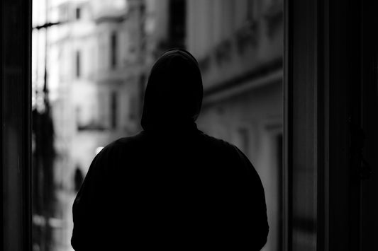 a person wearing a hood